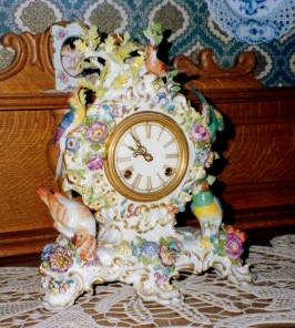Meissen ceremonial clock with plastic flower decoration and songbirds