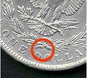 Mnzzeichen eines alten US-Dollars