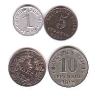 Einige Mnzen aus dem 1. Weltkrieg und kurz danach, mit geschwrzter 1/2 Mark aus Silber